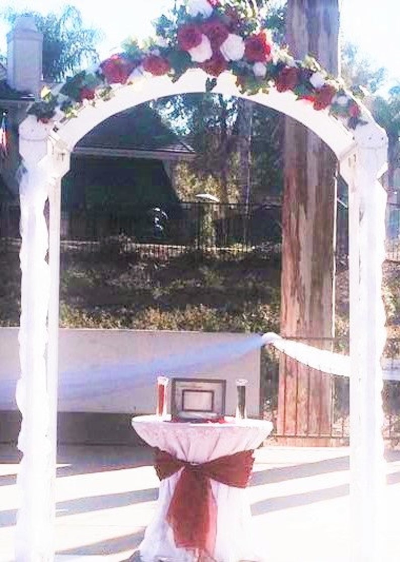 Red and white paper flower arch or table runner