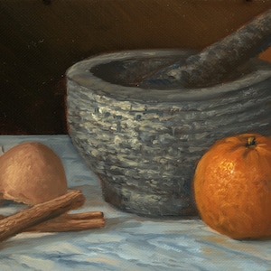May include: A still life painting of a gray stone mortar and pestle, an orange, two cinnamon sticks, and a broken eggshell on a white tablecloth. The background is a dark brown.