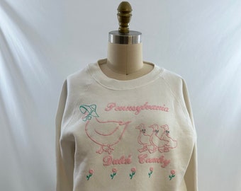 Vintage 80er Jahre Weiß Pennsylvania Dutch Country Ziel Rundhalsausschnitt Made in USA Pullover Pullover Small Medium