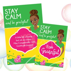 May include: Two green and yellow journal covers with a pink heart design. The covers feature a black woman with a bun and the text "Stay Calm and be grateful". One cover also has the text "A little bit of sassy, but oh so classy... Miss Congeniality Girls Gratitude Journal". The other cover has the text "I am Grateful".