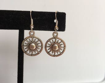 Silver sun or starburst earrings