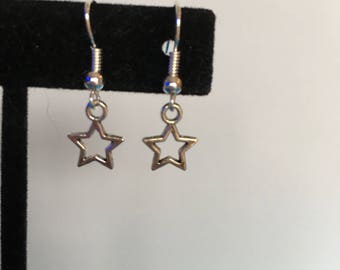 Tiny delicate silver star earrings