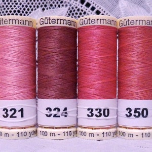 May include: Six spools of Gütermann thread in various shades of pink, brown, and beige. The spools are labeled with the numbers 307, 321, 324, 330, 350, and 357. Each spool contains 100 meters (110 yards) of thread.