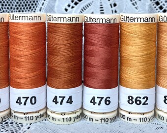 6 NEW different orange 110 yard spools 100% polyester GUTERMANN sew-all thread