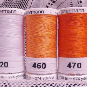 1 black 1 white 3 orange GUTERMANN 100% polyester sew-all thread 274 yard spools