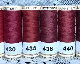 6 NIEUW verschillende bordeauxrode kastanjebruine spoelen van 110 yard 100% polyester GUTERMANN-naaigaren