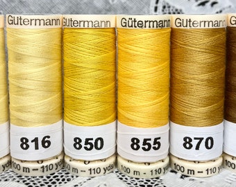 6 NOUVELLES bobines différentes jaune or 110 yards 100% polyester GUTERMANN couture tout fil