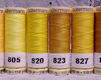 6 NOUVELLES bobines jaune or 110 yards 100% polyester GUTERMANN coudre-tout le fil