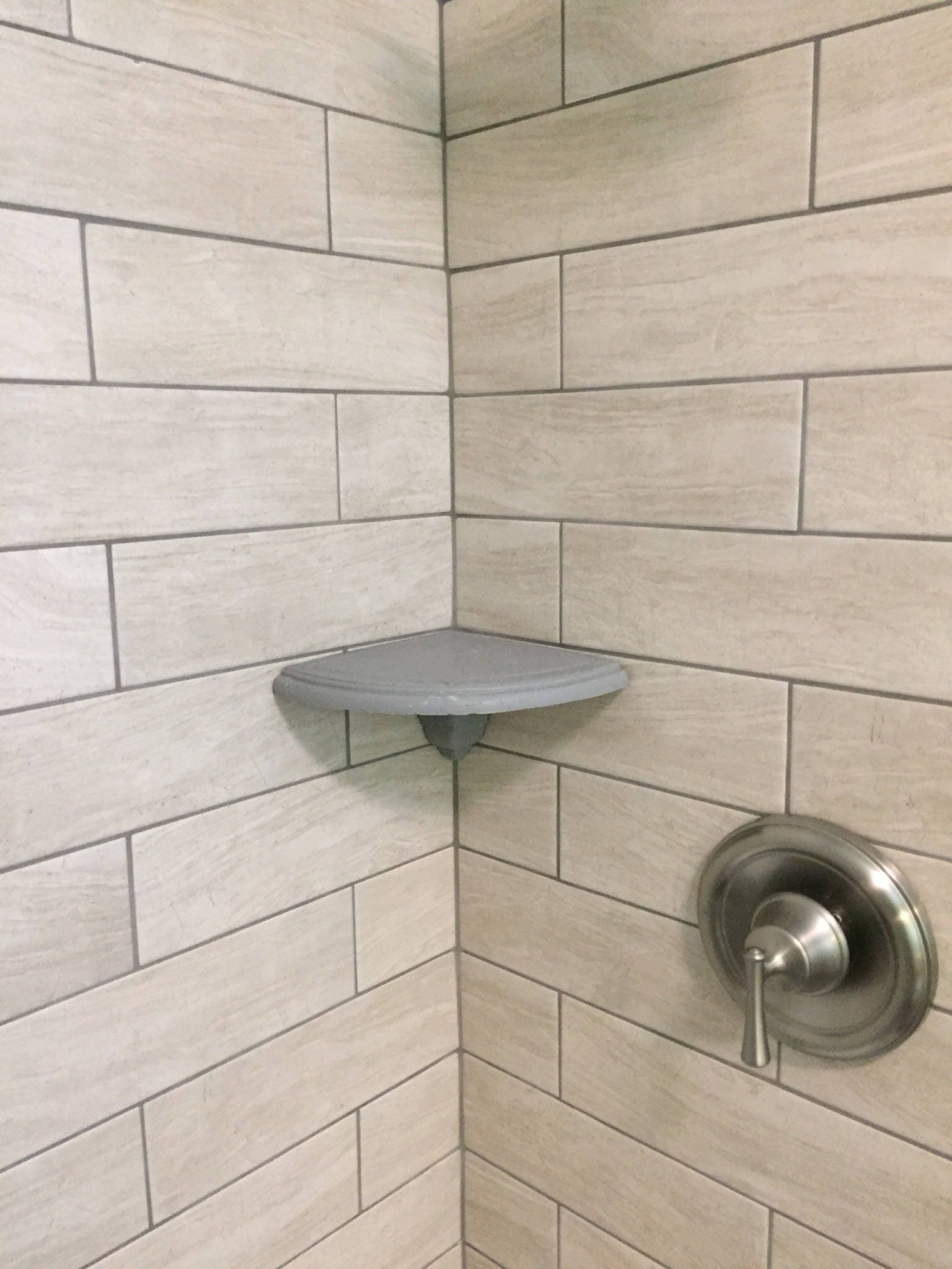 Install a Corner Shower Shelf With Tiles