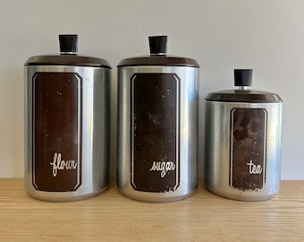 Juego de botes West Bend de 3 piezas de aluminio con diseño marrón y asas