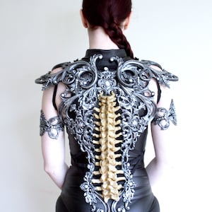 Silver & Bone Effect Spine Metallic Latex Rubber Filigree Back Piece ...