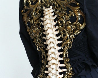Gold & Bone Effect Spine Metallic Latex Rubber Filigree Back