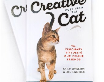 Two copies of Creative Cues From the Cat! A fun clever book to inspire creativity and vision. For makers and cat lovers. Kickstarter funded.
