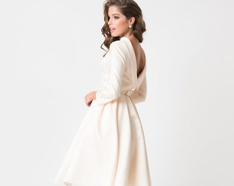cream gown with sleeves