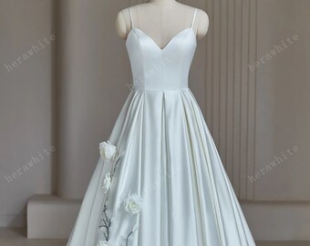 Sophisticated A-Line Wedding Dress With Spaghetti Straps Satin Bridal Gown Sleeveless V Neckline 3D Flower Details on Skirt