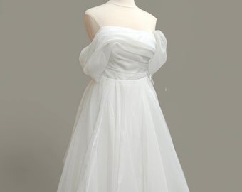 Elegant Off the Shoulder A-Line Wedding Dress Timeless Bridal Gown Straight Neckline Open Back Beautiful Flowing Train