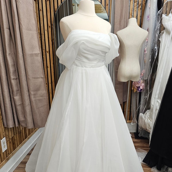 Elegant Off the Shoulder A-Line Wedding Dress Timeless Bridal Gown Straight Neckline Open Back Beautiful Flowing Train