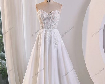 A-line Wedding Gown With Sweetheart Neckline And High Side Split Sleeveless Bridal Gown Strapless Backless Design