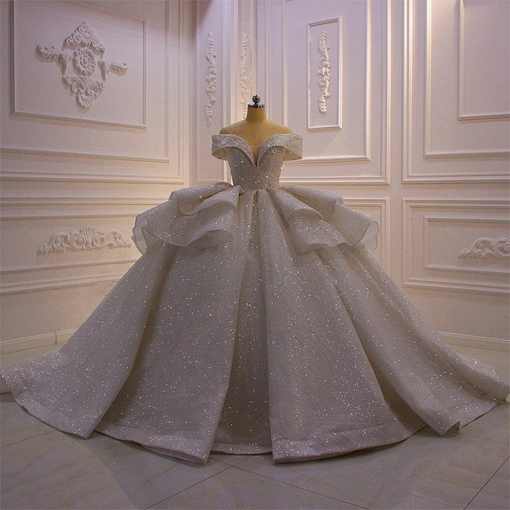 Shiny white shop wedding dress