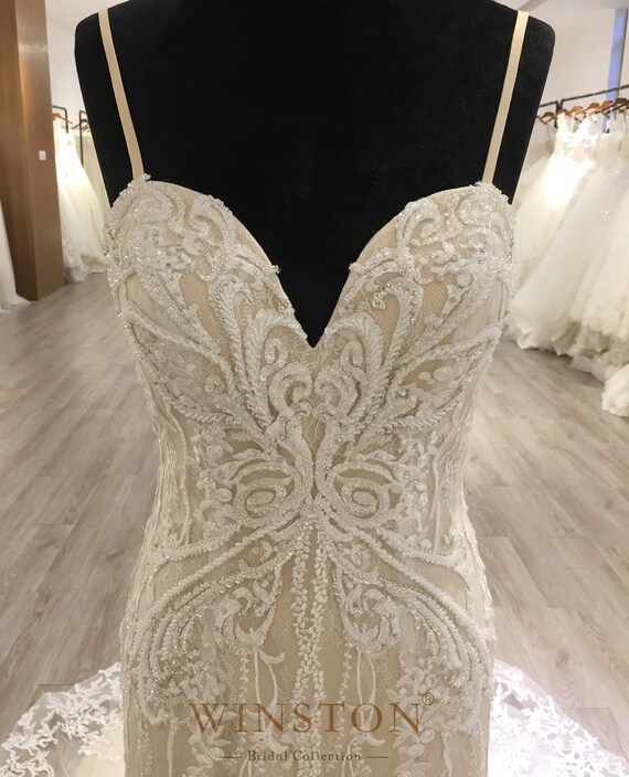 spaghetti strap trumpet wedding dress