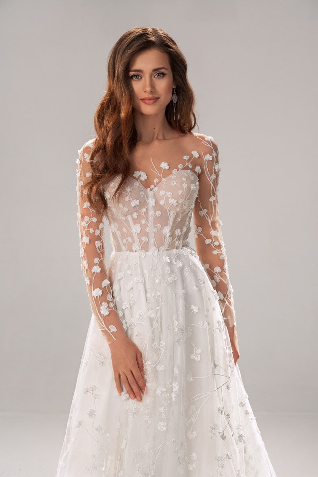 loveangeldress Luxury Rhinestones Wedding Dress with Illusion Long Sleeves US16 / Ivory