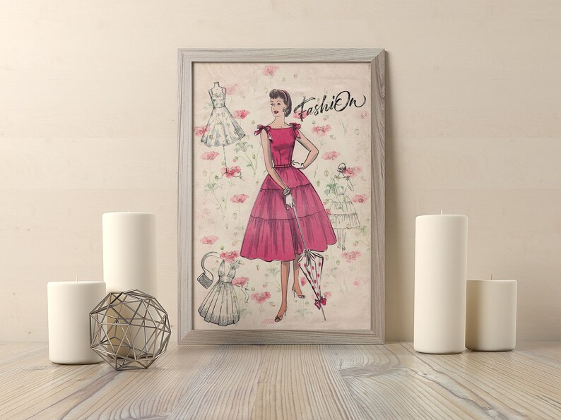 May include: A framed vintage illustration of a woman wearing a pink dress with a white collar and a white glove. The woman is holding a pink and white umbrella. The illustration is surrounded by a floral pattern and the word "Fashion" is written in the top right corner.