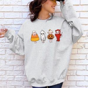 Kewpie Halloween Crewneck Sweatshirt Cute Baby Doll Shirt Trick Or Treat Outfit Candy Corn Ghost Pumpkin Devil Kewpie Sweatshirt