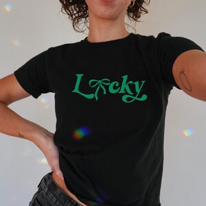 lucky green coquette bow st patricks day baby tee