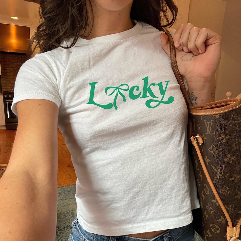 lucky green coquette bow st patricks day baby tee