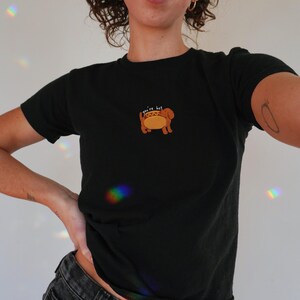 flirty hot dog you're hot baby tee