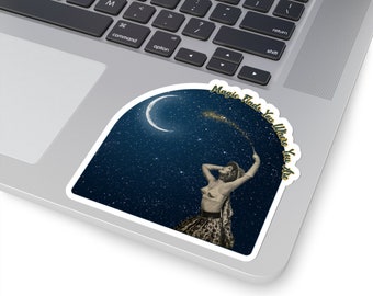 May include: A sticker featuring a vintage-style illustration of a woman with a wand, set against a starry night sky with a crescent moon. The sticker has the text "Magic Finds You Where You Are" in a curved font.