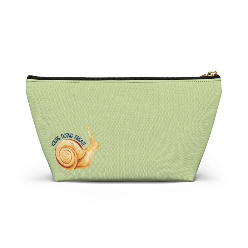 T-bottom pouch in moss green with a mushroom and the words Gorgeous Goblin Gear on the front and a cute snail with a positive message of You're doing great! on the back. White zipper