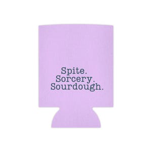 Can cooler featuring a dark serif font design that reads “Spite. Sorcery. Sourdough.” printed on a purple background.
