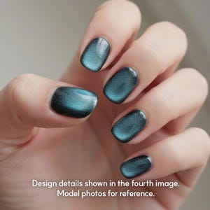 May include: Close-up of a hand with teal-colored nail polish. The polish has a shimmering, cat-eye effect, with a dark base and a lighter, reflective top coat. The nails are neatly shaped and polished. The text in the image says: Design details shown in the fourth image. Model photos for reference.