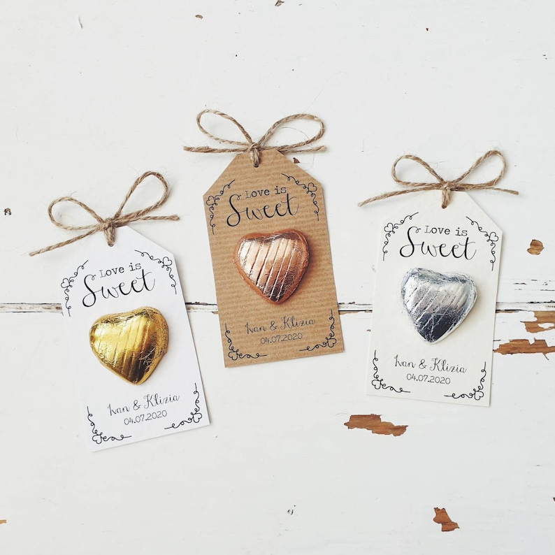 Affordable Tasty Edible Wedding Favors Love is Sweet Chocolate Heart with tags.