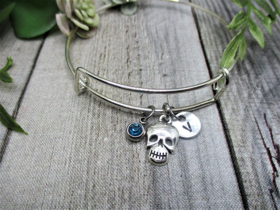 Skull charm bracelet deals