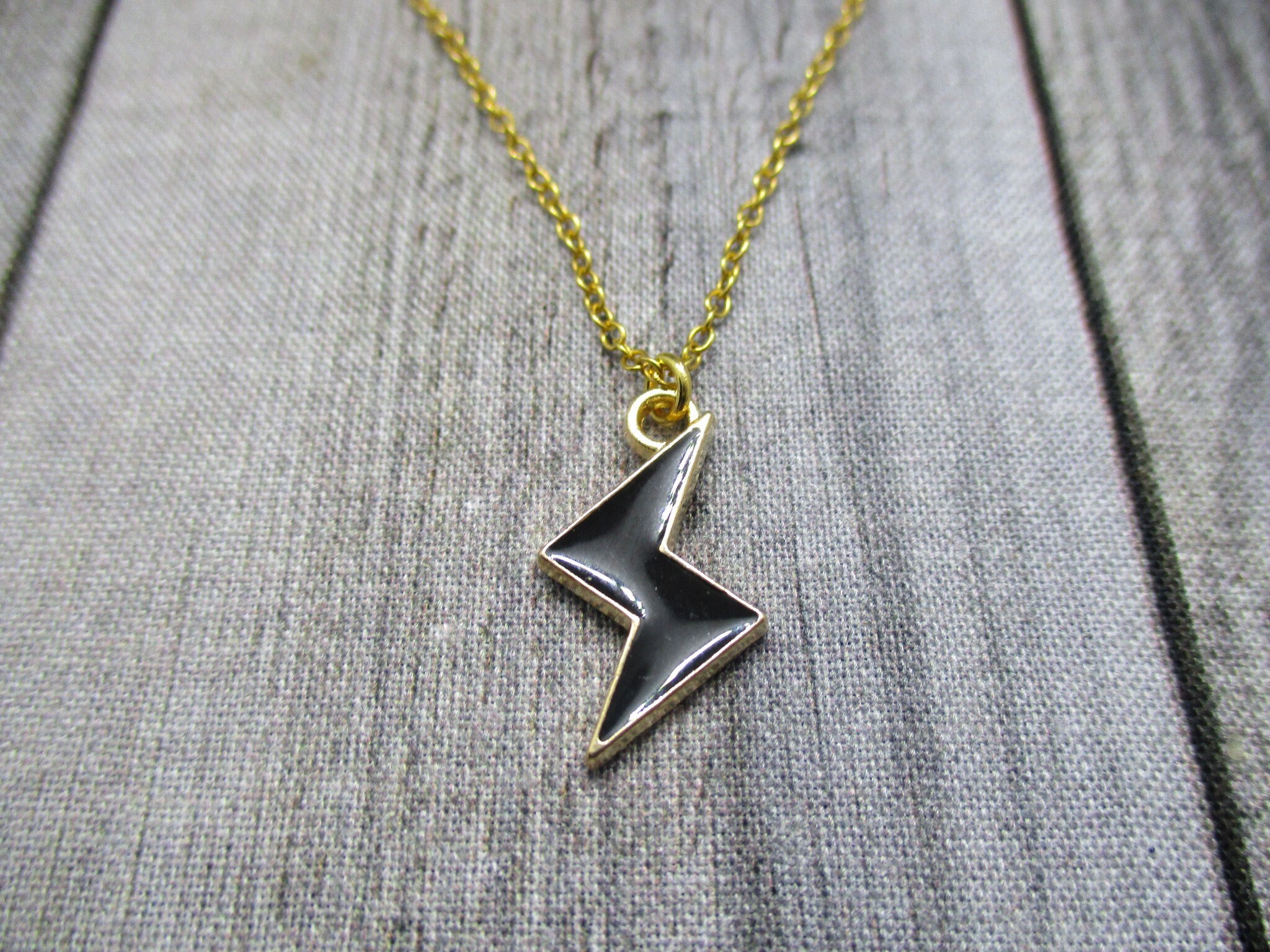 Gold Lightning Bolt Necklace Black 