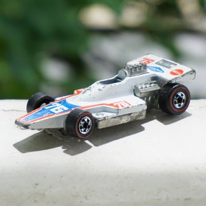 Coche de Fórmula 5000 HOT WHEELS Redline coleccionable vintage de 1975, n.º 76. Fabricado en Hong Kong.