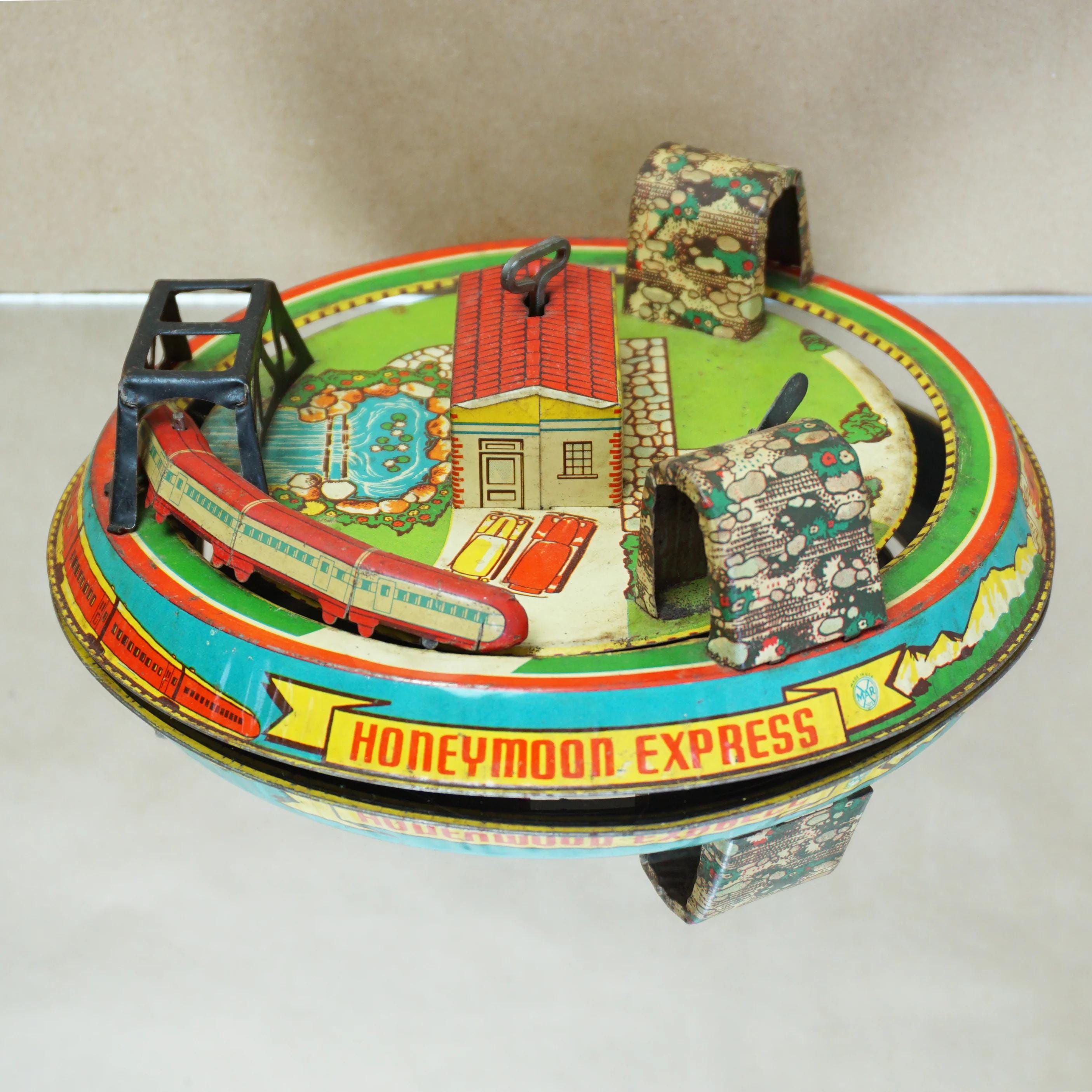レトロ、アンティーク風 缶詰型の貯金箱7つセット スチール缶アメリカン雑貨 1950s Vintage Litho Tin MARX Honeymoon Express Glendale Station