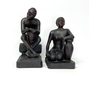 Vintage African Woodcarving Sculpture Ebony Man with Drum Woman with Pot Matched Pair
