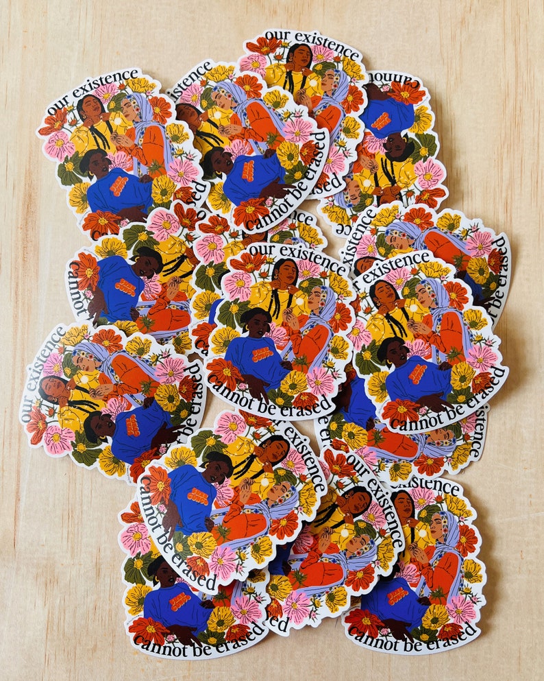 May include: A stack of colorful stickers with three women holding hands in a circle. The stickers have a floral design and the text "Our existence cannot be erased".