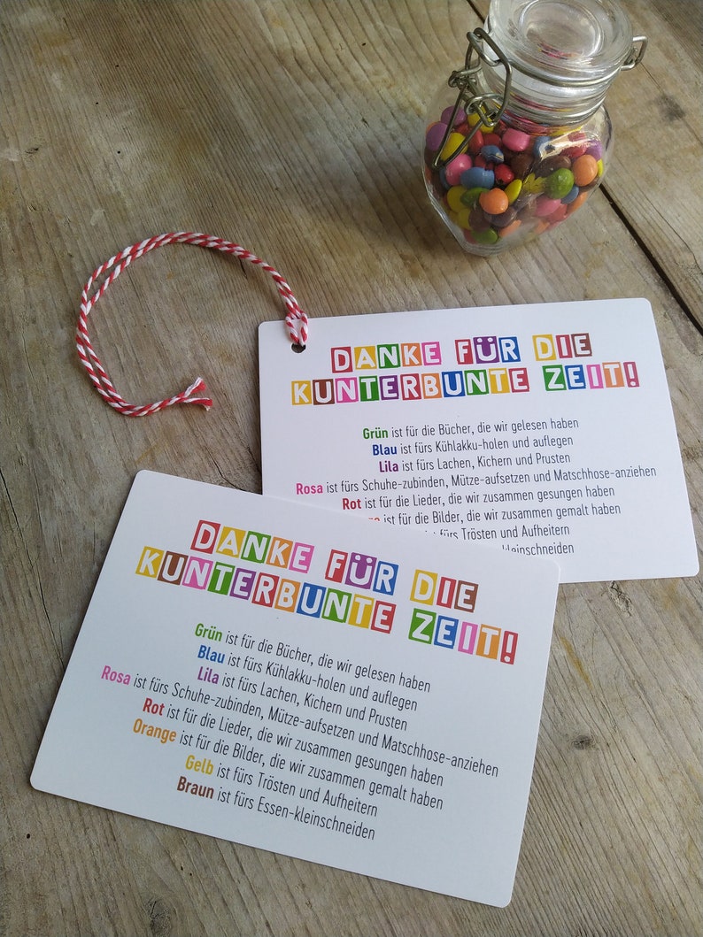 May include: Two colorful cards with the text "Danke f&uuml;r die Kunterbunte Zeit!"  The cards are decorated with colorful squares and list activities associated with each color.  The text on the cards is in German.