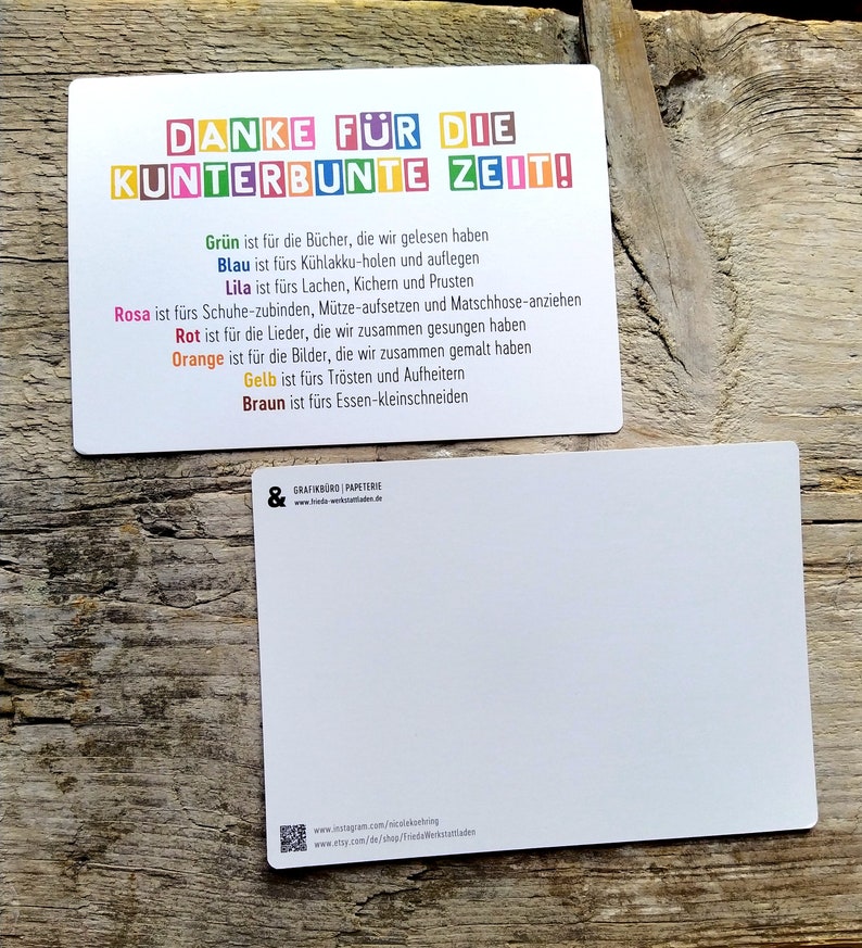 May include: A colorful thank you card with the text "DANKE F&Uuml;R DIE KUNTERBUNTE ZEIT!" and a list of colors and their meanings in German. The card is on a wooden surface.