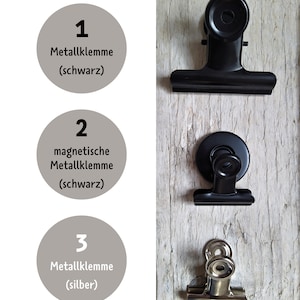May include: Three different types of metal clips. The first is a black metal clip, the second is a black metal clip with a magnet, and the third is a silver metal clip.