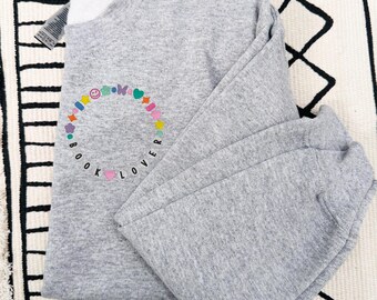 Embroidered Book Lover Friendship Bracelet Sweatshirt