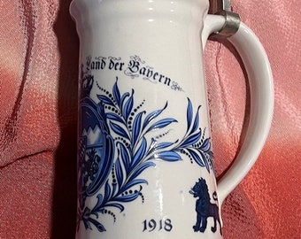 Beautiful tall beer stein with lid