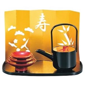 May include: A traditional Japanese sake set featuring a black teapot with a handle, a stack of red cups, and a gold folding screen with white cut-out designs and Japanese characters. The set is displayed on a black tray.