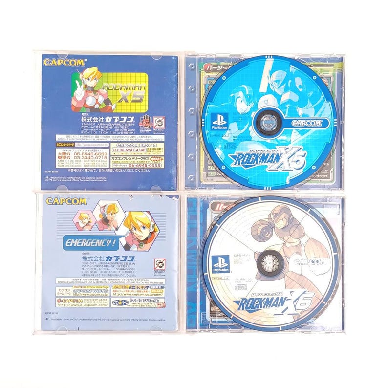 Puede incluir: Cuatro cajas de juegos de video para la consola PlayStation. Las cajas son azules y blancas con im&aacute;genes de robots y el texto "Rockman X5".