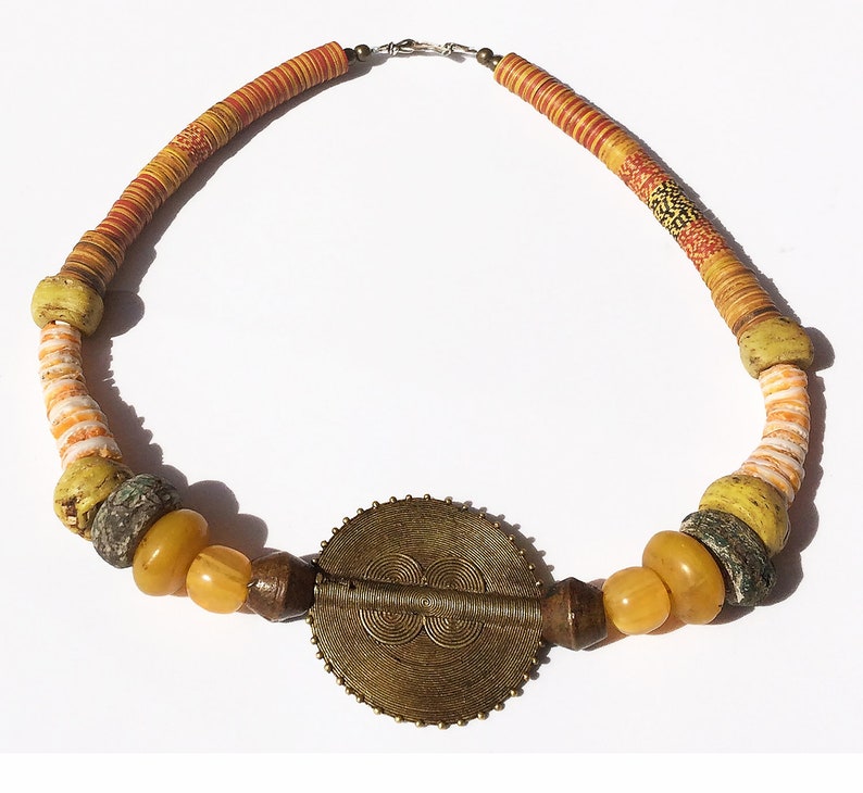 GWG Necklace 02 ~ Sunny Day\u2014ANTIQUE VTG Beads\u2014Lobi brass sun disk\u2014old resin egg yolk amber\u2014Hebrons\u2014rare colors vulcanite\u2014old bronze beads