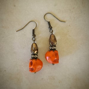Skull with jewel crown earrings